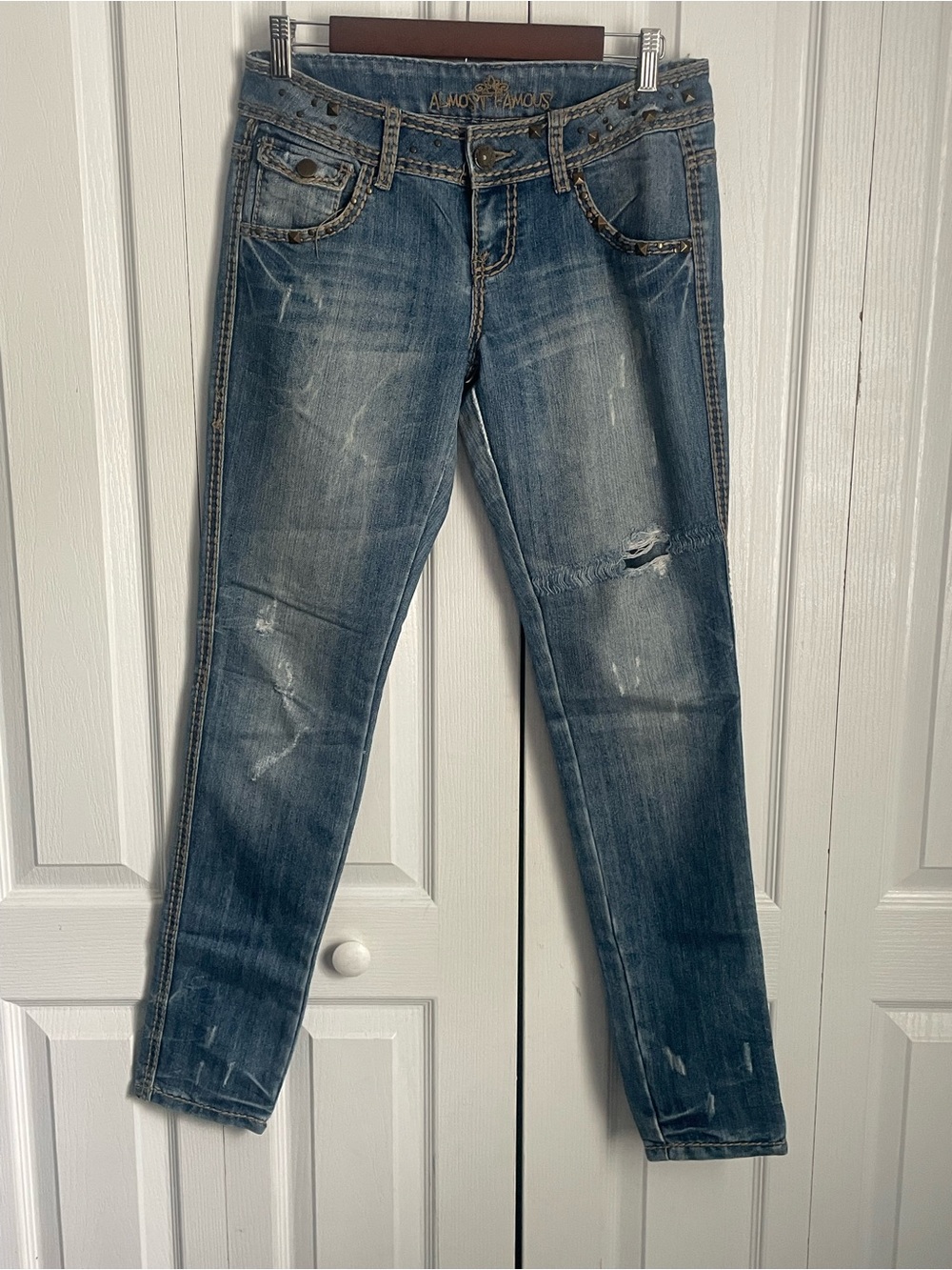 Almost Famous Women's Faded Blue Distressed Straight Jeans, Size 7